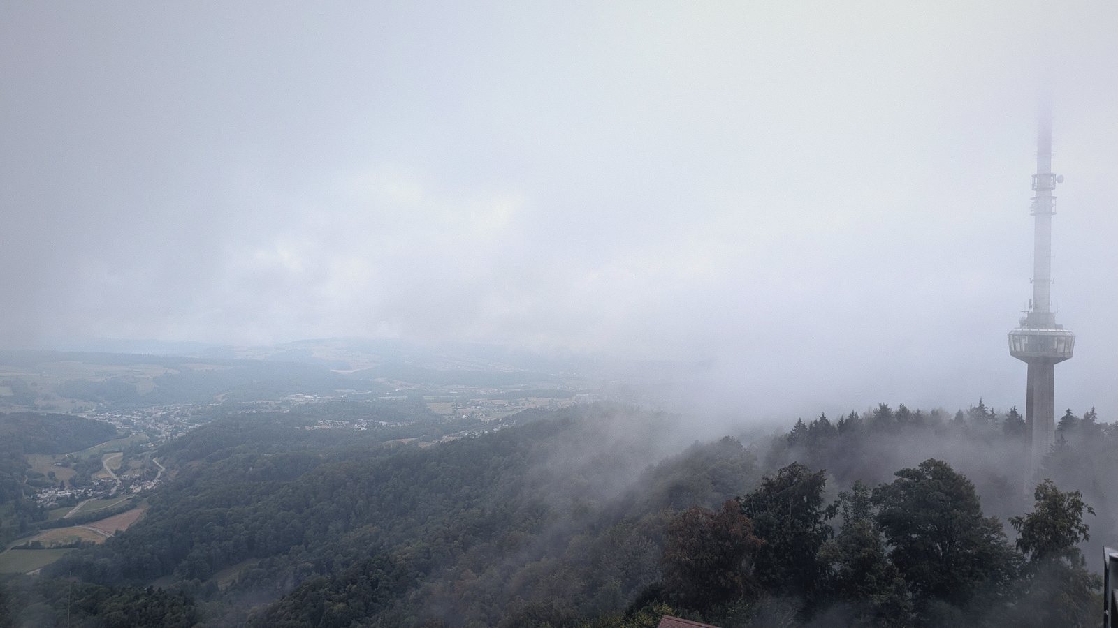 tv tower cloud hillside
